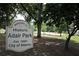 A welcome sign for Historic Adair Park (est. 1892) stands near the park playground at 726 Brookline Sw St, Atlanta, GA 30310