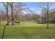 Scenic view of Adair Park with flowering trees and walking paths at 726 Brookline Sw St, Atlanta, GA 30310