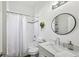 Clean bathroom with white subway tile and modern fixtures at 726 Brookline Sw St, Atlanta, GA 30310