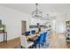 Elegant dining area open to kitchen, featuring a wooden table with seating for six at 726 Brookline Sw St, Atlanta, GA 30310