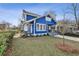 Charming blue home exterior with a well-manicured lawn at 726 Brookline Sw St, Atlanta, GA 30310