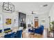 Open-concept layout with a cozy living area, dining space, and a sleek fireplace at 726 Brookline Sw St, Atlanta, GA 30310