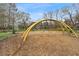 Playground equipment with swings and slides set on a mulch ground at 726 Brookline Sw St, Atlanta, GA 30310