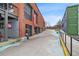 A brick building with businesses and an open entryway is visible from this street view at 726 Brookline Sw St, Atlanta, GA 30310