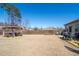 Expansive fenced backyard featuring an outdoor gazebo and patio area, ideal for relaxation and gatherings at 8125 Berrywood Se Ct, Covington, GA 30014