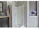 Bathroom featuring a shower, a modern vanity and a built-in niche for toiletries and decor at 2726 Northgate Nw Way, Acworth, GA 30101