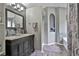 Well-appointed bathroom with a double vanity, modern fixtures, and a separate shower and tub at 2726 Northgate Nw Way, Acworth, GA 30101
