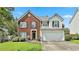 Charming two-story home with a well-manicured lawn and a two-car garage in a great neighborhood at 2726 Northgate Nw Way, Acworth, GA 30101