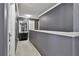Hallway with gray walls, white trim, and carpeted floor leading to various rooms in the house at 2726 Northgate Nw Way, Acworth, GA 30101