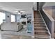 Cozy living room with a fireplace, plush seating, and a ceiling fan at 2726 Northgate Nw Way, Acworth, GA 30101