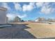 Large and open backyard surrounded by a wooden fence and views of neighboring homes at 3060 White Oak Mews, Decatur, GA 30034