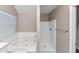 Bathroom featuring a soaking tub, shower, and a window at 3060 White Oak Mews, Decatur, GA 30034