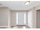 Bright entryway with a white door and neutral walls, creating a welcoming first impression for the home at 3060 White Oak Mews, Decatur, GA 30034