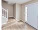 Inviting home entryway featuring hardwood-style floors and the stairs to the second level at 3060 White Oak Mews, Decatur, GA 30034