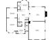 Main level floor plan showing the layout of the kitchen, dining room, living room, den, and garage at 3060 White Oak Mews, Decatur, GA 30034