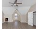 Upstairs room with a vaulted ceiling and hardwood floors at 3060 White Oak Mews, Decatur, GA 30034