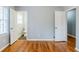 Bedroom with hardwood floors featuring access to a bathroom and closet at 3368 Windsor Castle Ct, Decatur, GA 30034