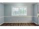 Bright dining room featuring natural light, hardwood floors, and neutral paint at 3368 Windsor Castle Ct, Decatur, GA 30034