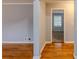 A view of the entryway boasting hardwood floors and soothing light gray painted walls at 3368 Windsor Castle Ct, Decatur, GA 30034