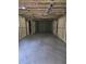 Long unfinished basement with concrete floors and studded walls at 8033 White Stone Blvd, Douglasville, GA 30135