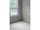 Bright bedroom with natural light, featuring a window and ample space at 8033 White Stone Blvd, Douglasville, GA 30135