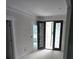 Bright entryway featuring a decorative glass front door and classic white trim detail at 8033 White Stone Blvd, Douglasville, GA 30135