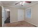 Comfortable bedroom with carpet, ceiling fan, closet and abundant natural light at 2024 Rosewood Rd, Decatur, GA 30032