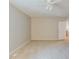 Bedroom boasts neutral paint, carpet, and a ceiling fan at 3998 Chimney Ridge Dr, Ellenwood, GA 30294