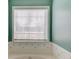 Relaxing bathtub, window for ample light and stylish tile trim at 1553 Nicole Ridge Ct, Loganville, GA 30052