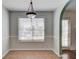 Charming dining area with a view to the patio and natural light at 1553 Nicole Ridge Ct, Loganville, GA 30052