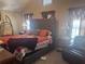 A traditionally furnished bedroom features a large bed and an upholstered headboard at 2610 Gadsen Walk, Duluth, GA 30097