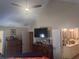 Bedroom with vaulted ceiling, and ensuite bathroom, and two dressers at 2610 Gadsen Walk, Duluth, GA 30097