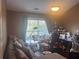 Bonus room with hardwood flooring, a large window and lots of space at 2610 Gadsen Walk, Duluth, GA 30097