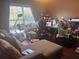 Bonus room with hardwood flooring, a large window and comfortable seating at 2610 Gadsen Walk, Duluth, GA 30097