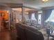 Spacious living room with hardwood floors and access to a bathroom and dining room at 2610 Gadsen Walk, Duluth, GA 30097
