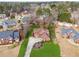 Aerial shot showcases the beautiful home, green lawn, and the surrounding neighborhood at 3207 Haleys Way, Conyers, GA 30013
