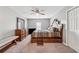Bedroom featuring neutral walls, carpeted floors, and a decorative bed frame at 3207 Haleys Way, Conyers, GA 30013