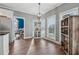 Charming breakfast nook with bright windows and a view to the exterior and access to another room at 3207 Haleys Way, Conyers, GA 30013