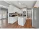 Well-appointed kitchen with an island, stainless steel appliances, and access to an outdoor area at 3207 Haleys Way, Conyers, GA 30013