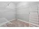 Spacious walk-in closet with custom shelving at 3207 Haleys Way, Conyers, GA 30013