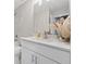Beautiful bathroom featuring a tub with tile surround and a granite countertop at 8023 White Stone Blvd, Douglasville, GA 30135