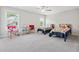 Well lit bedroom with two twin beds at 8023 White Stone Blvd, Douglasville, GA 30135