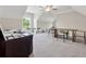 Spacious bonus room with carpet, ceiling fan and natural light at 8023 White Stone Blvd, Douglasville, GA 30135