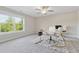 Bright home office featuring large window and gray carpet at 8023 White Stone Blvd, Douglasville, GA 30135