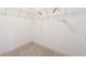 Bright walk-in closet with wire shelving and neutral carpet at 8023 White Stone Blvd, Douglasville, GA 30135