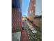 Backyard with stone pavers between two houses at 2571 Royston Dr, Duluth, GA 30097
