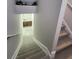 Carpeted stairs leading to the basement area with a wet bar at 2571 Royston Dr, Duluth, GA 30097