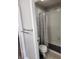 Bathroom with a shower-tub combination and white tiled walls at 2571 Royston Dr, Duluth, GA 30097