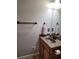 Bathroom with a wood vanity and neutral wall color at 2571 Royston Dr, Duluth, GA 30097