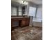 Bathroom showcasing double sink vanity, bathtub, tile flooring, and natural lighting at 2571 Royston Dr, Duluth, GA 30097